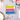 Colorful cake-shaped plate with decorative elements on a light gray background