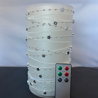 White LED Wax Pillar Water Candle w/ Silver Star Garland Candle Slipcover